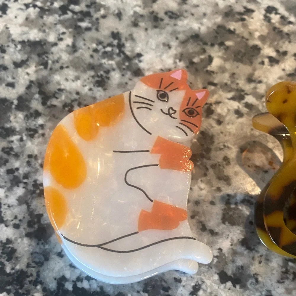 Set of 2 cat hair claws